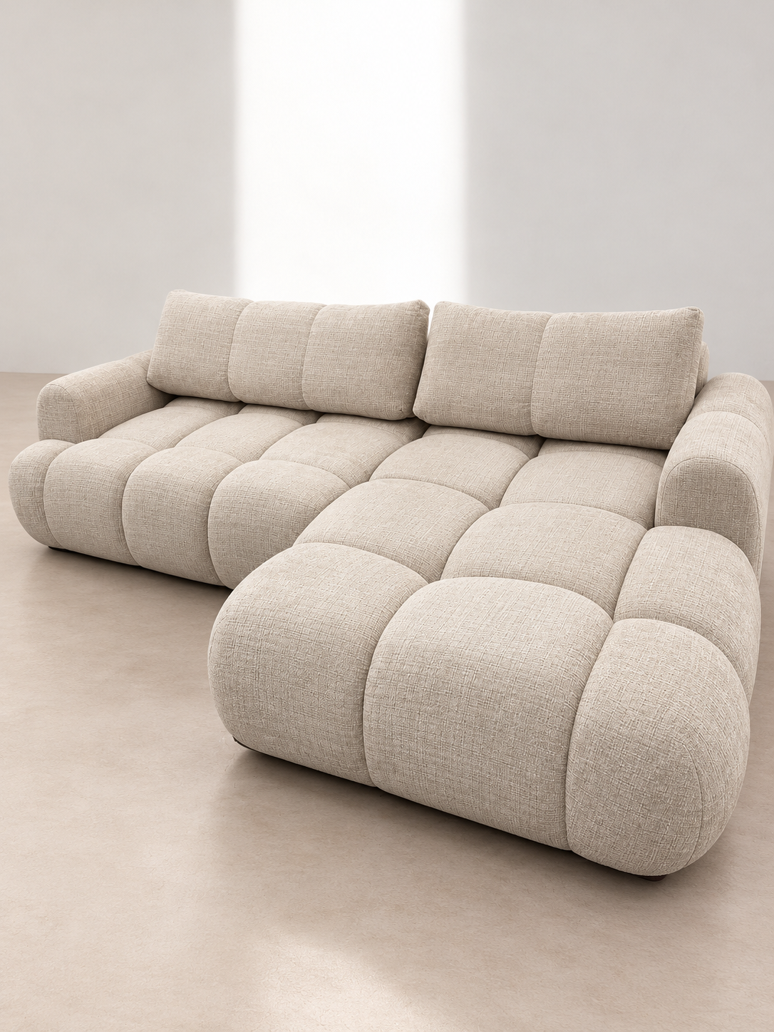 Canapé d'angle convertible Noa – Tissu beige capitonné avec coffre de rangement Canapés 2BB5AC23-E435-47AD-B172-6CC1175545E8 Oona Mobilier